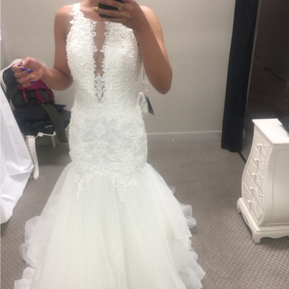 This is a brand new wedding dress